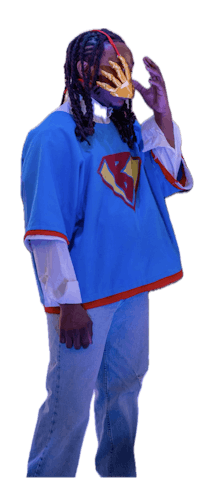 a man wearing a superman cape and blue jeans